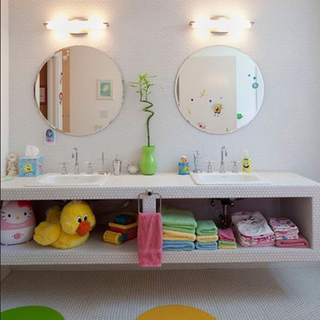 consider adding additional storage baskets and bins to reduce the clutter of bath toys and goodies