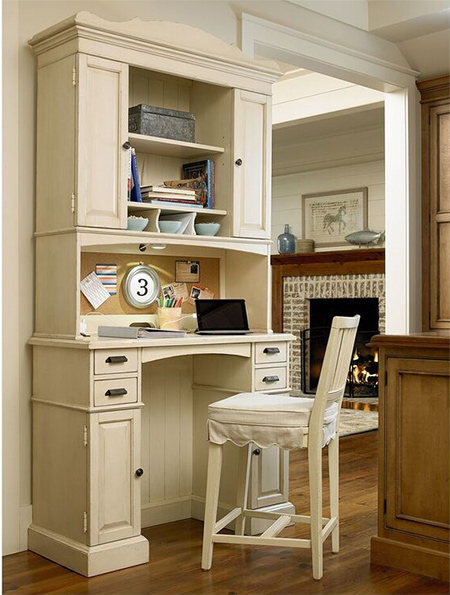 With cabinet space, shelving and a built-in corkboard, this all-in-one desk streamlines a cluttered office