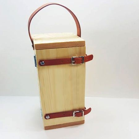 This is a plain pine box, but what adds character and makes it unique are the leather straps and added accessories. You can find leather and accessories at leather suppliers or larger fabric stores, or see if you have an old leather belt that you can repurpose. 