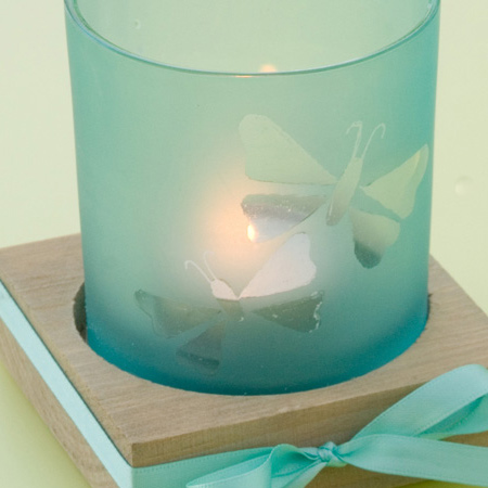 Seaglass votive with engraved butterfly design