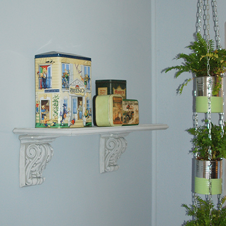 This quick and easy shelf is made using a couple of polystyrene corbels, a scrap of timber or board, and some moulding.