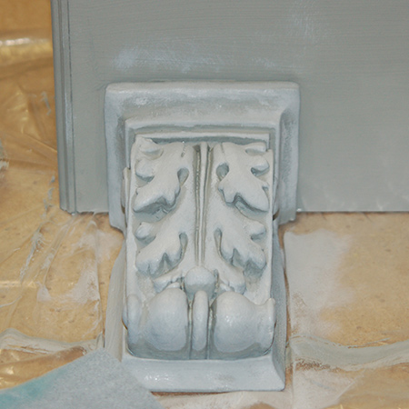 Close up of the corbel after a base coat of Rust-Oleum Chalked in Country Grey and a top coat of Aged Grey