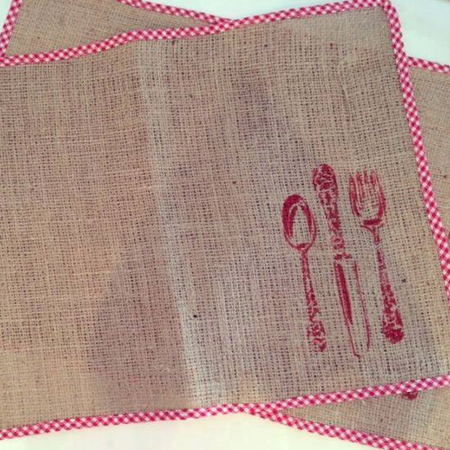 Give a new twist to burlap placemats by using a stencil and craft paint to print your own designs.