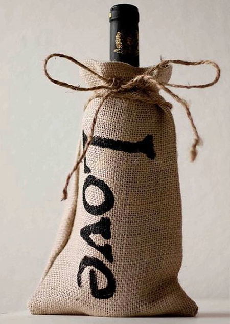 Just in time for the festive season... use burlap to wrap gifts that have an awkward shape such as wine bottles. Add a stencilled logo or wording