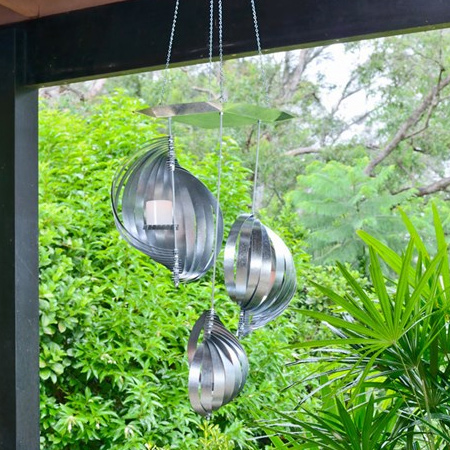 This DIY sculptural metallic chandelier will add a soft evening glow to your patio, deck or entertainment area.