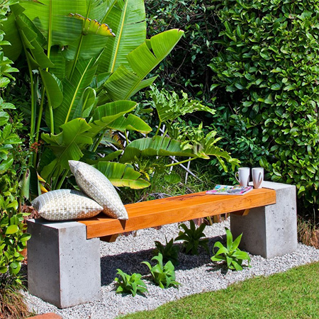 Combine the strength of concrete with the warmth of wood to make a stylish bench for the garden.