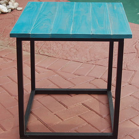 The completed steel frame side table with Rust-Oleum Chalked top.