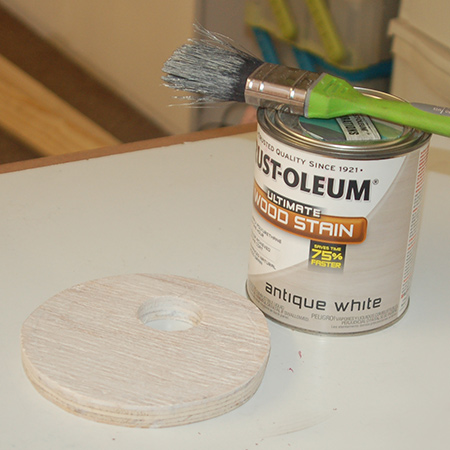use a paintbrush to apply the stain