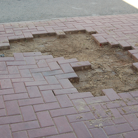 Repair dips and bumps in paving or driveway