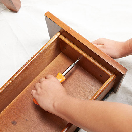 1. Take out the drawers to make it easier to Remove all existing hardware from the desk. 