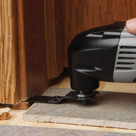 When you need to trim a door or frame so new flooring will fit, a multifunction tool is ideal for the job. Use a flush-cutting wood blade attachment.