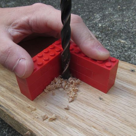 HOME-DZINE | DIY Tips - Using a few lego blocks - or small scraps of timber - you can quickly make a handy jig that allows you to drill straight holes. All that's really necessary is a perfect 45-degree corner that will help you guide the drill bit at a perfectly straight angle.