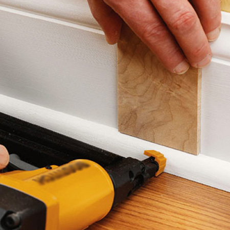 Use a brad nailer to build up decorative layers when mounting skirting boards or window trim.