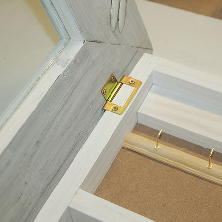 BELOW: Frame attached to cabinet / box frame with butt hinges.