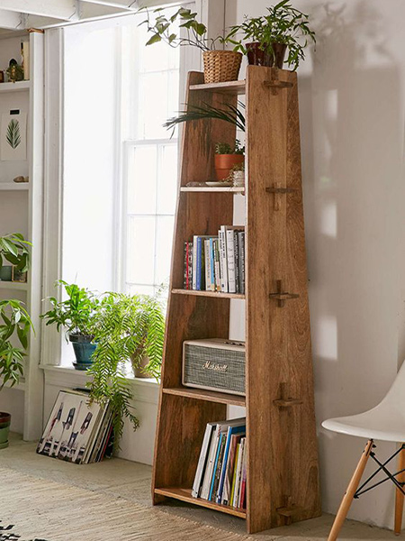Use laminated pine shelving to make this wooden bookcase. The unit assembles easily and can be taken apart in a jiffy.