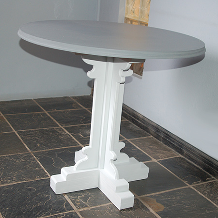 The pedestal table is painted in shades of grey - a light grey on the base and dark grey on the top - in Prominent Paints Premium Satin Silk.