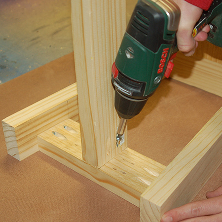 8. Use wood glue and pockethole screws to secure the top and bottom rails to the sides.