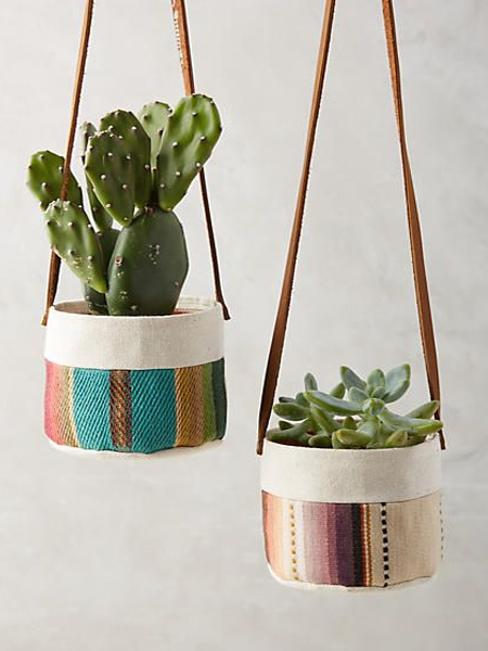 Colourful fabric scraps are sewn together to make fun containers for hanging plants