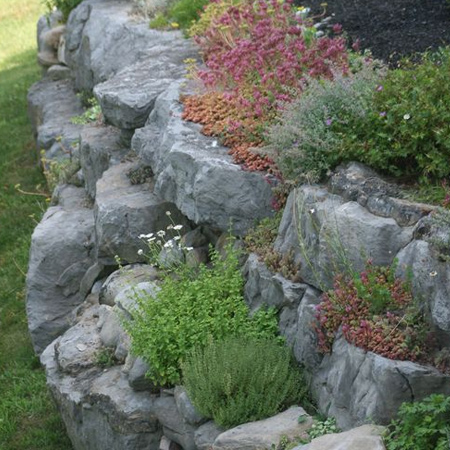 Making your own artificial rocks is a cost effective way to add interest to garden landscaping or design unique water features.