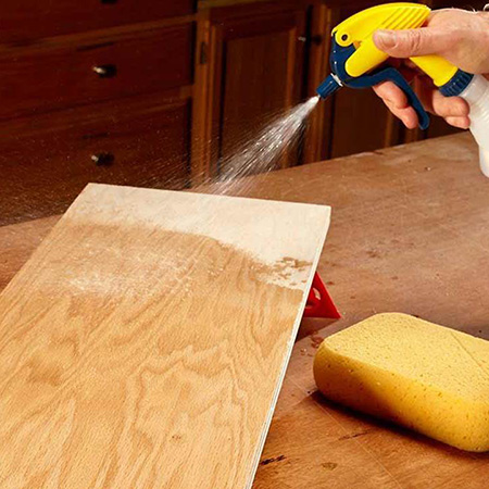 try wetting the wood with distilled water before applying your stain