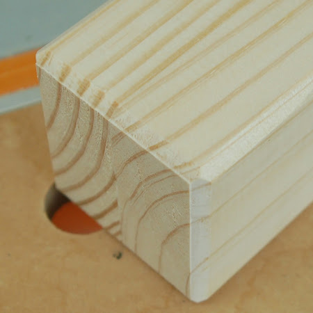 There are a variety of tools that can be used to make a chamfered edge, and you can even do a chamfered edge with a sander, but a very professional way of chamfering an edge is to use a router.
