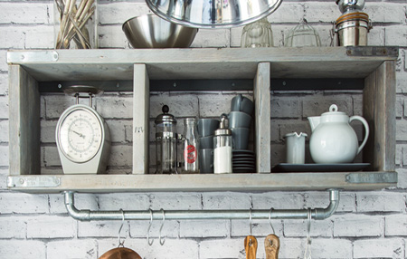 Use reclaimed pallets or scaffolding planks to make a stylish industrial shelf.