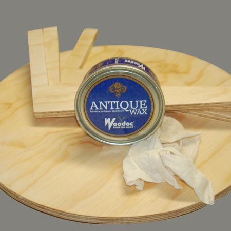 After sanding, wipe down and then apply Woodoc Antique Wax. If you prefer, you can also use a stain and sealer, tinted sealer, varnish. whitewash, or paint the table or table top. I wanted to have a more natural finish in line with Danish trends.