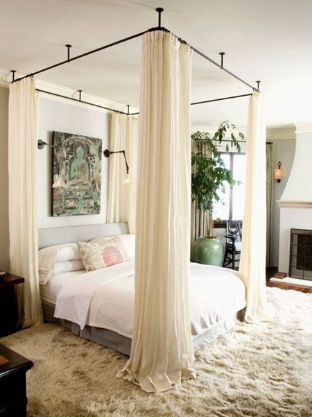 What is a Canopy Bed: Canopy beds are named such due to their tall, four poster design that incorporates either an overhanging surface or frame from which you can drape cloth, or hang curtains. These were once very popular due to the lack of central heating and when the cloth was pulled closed it provided a warm space to sleep within each night. 