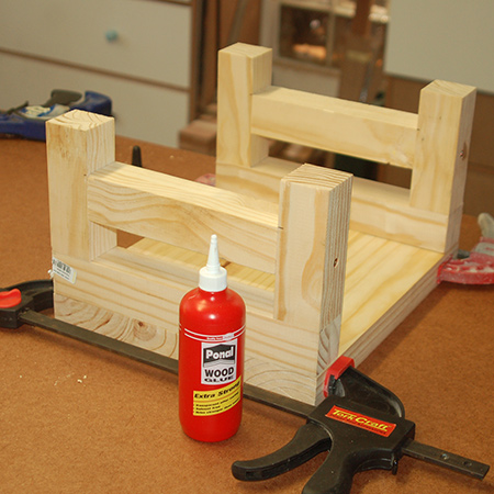 6. Small step stool: Glue the legs to the slat seat. 