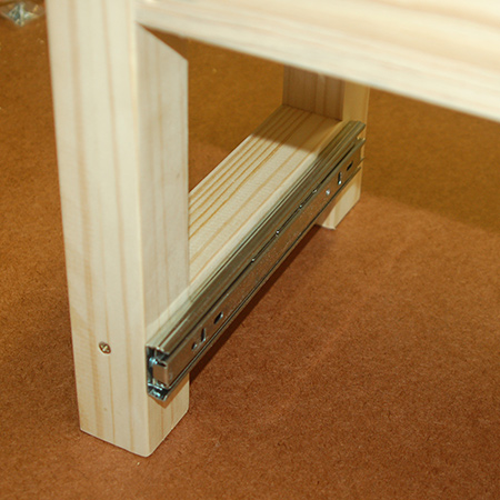 10. Secure the 250mm drawer runners to the leg rail on the large stool with 16mm screws.