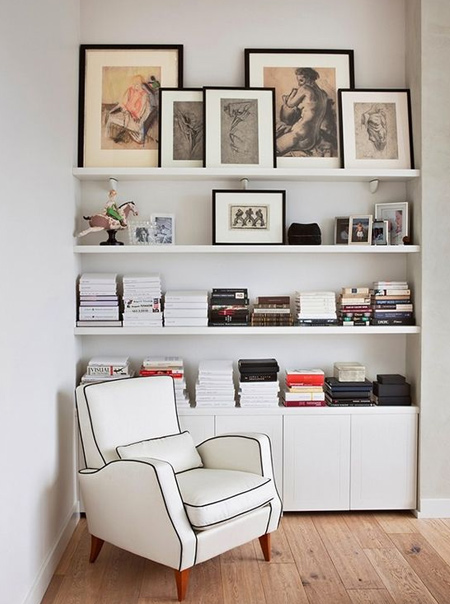 Turn an alcove into a cosy reading nook by adding shelves