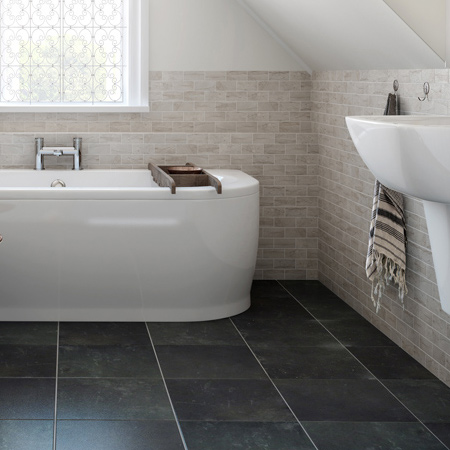 The more textured a tile is - the less slippery. Polished and semi-polished tiles are not recommended for a family bathroom.