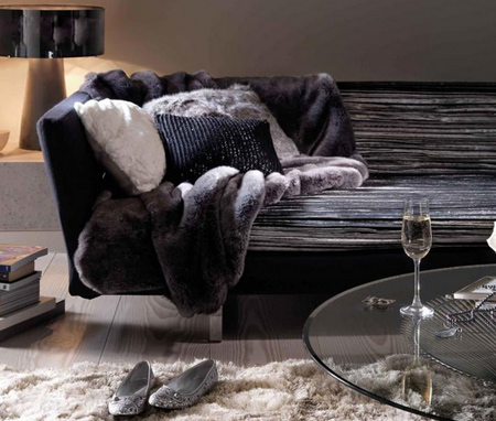 Fill your living room with cushions, thick-pile rugs and luxurious chenille blankets