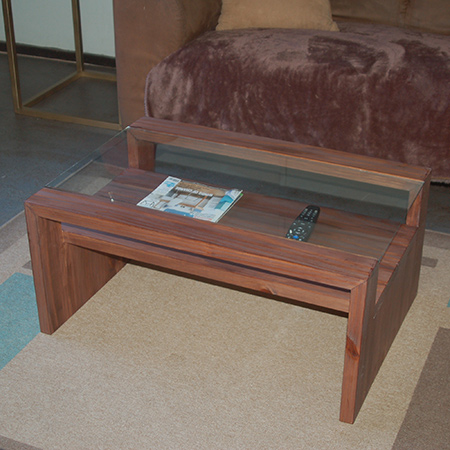 The coffee table is made of 32 x 94mm pine and will cost around R600 to make, excluding safety glass.