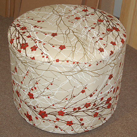 Nancy and Lindiwe made a circular upholstered ottoman. Comfortable, sturdy and lightweight, you can easily make your own circular ottoman and upholster in your choice of fabric.