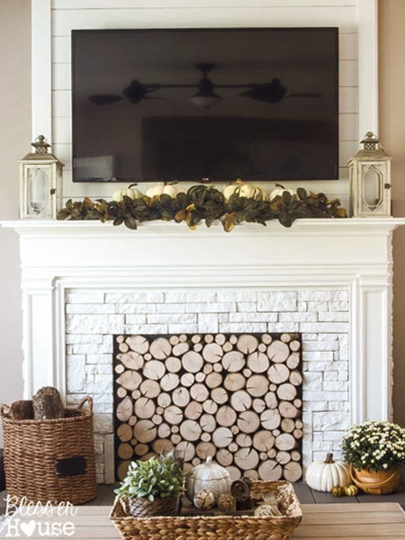 HOME-DZINE - Faux Fireplace Ideas - When building a faux fireplace, the most important aspect is to make the fireplace look like it belongs, and is not just stuck there. Draw up a basic idea for the fireplace and look how you can incorporate add-ons to make it an authentic feature.