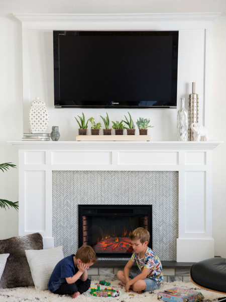 HOME-DZINE - Faux Fireplace Ideas - Designed by pneumaticaddict.com, this faux fireplace is completely portable, so it's ideal for a rental home. It was designed to accommodate an electric fire that looks very realistic.