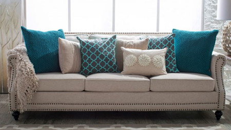 Tie colours into the overall scheme by choosing cushions with complementary colours - or hues from the same colour swatch.