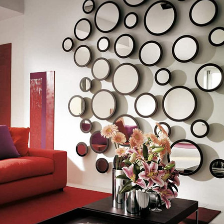 Mirrors are a wonderfully affordable way to bounce light around a room and create the illusion of space