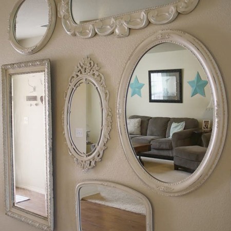 A wall of mirrors creates an instant feature and it works wonders for brightening up a dark corner in a room