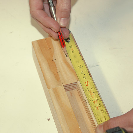 4. On the top, mark out for drilling the pen or pencils.