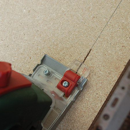 Setting up the PKS 16 is as easy as plugging in. Once you've drawn a cutting line on the board, switch on and use the guide at the front of the tool to cut perfectly straight lines.