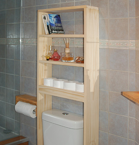 An above-toilet shelf unit is a great way to add extra storage to a small or cramped bathroom.