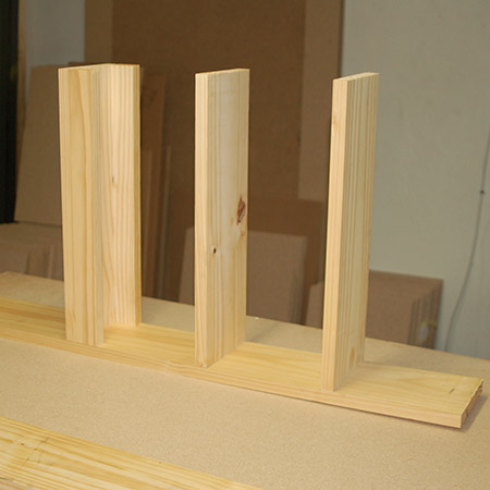 Mark the location that you want for your shelf and then glue onto one of the side pieces and leave for 30 minutes.