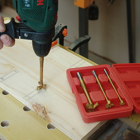 drill holes with MAD bit