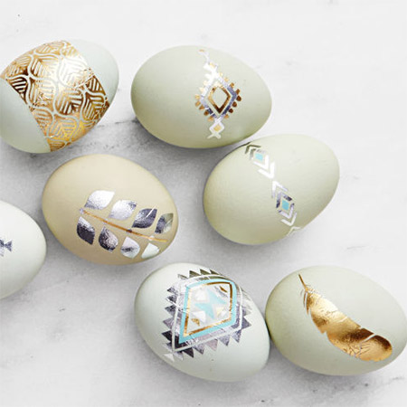 These beautiful metallic design eggs would look great in any Easter setting. Paint the eggs in muted colours and then use metallic foil to create tattoo designs.