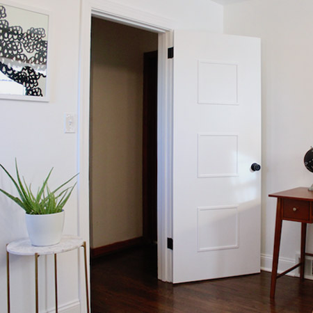 Here's an easy way to give doors a makeover with pine moulding strips and glue.