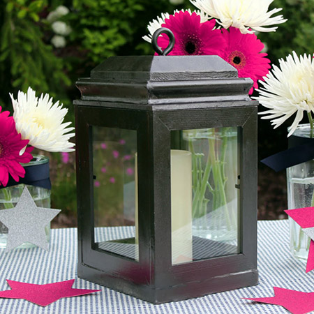 This decorative wooden lantern is perfect for dressing up a table and is cheap and easy to make if you already have some cheap wooden frames lying around.