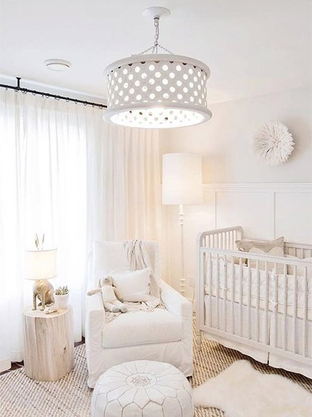 Gender neutral white nursery with wood accents rustic modern
