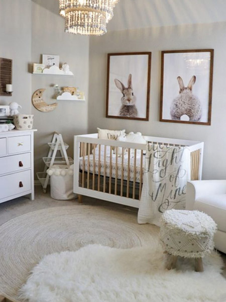 Gender neutral white nursery with traditional style